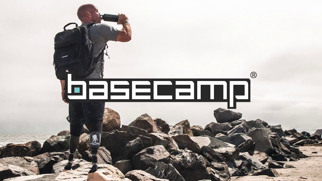 Dan Nevins drinks from a Basecamp water bottle. Basecamp is a brand that gives back to Wounded Warrior Project®.
