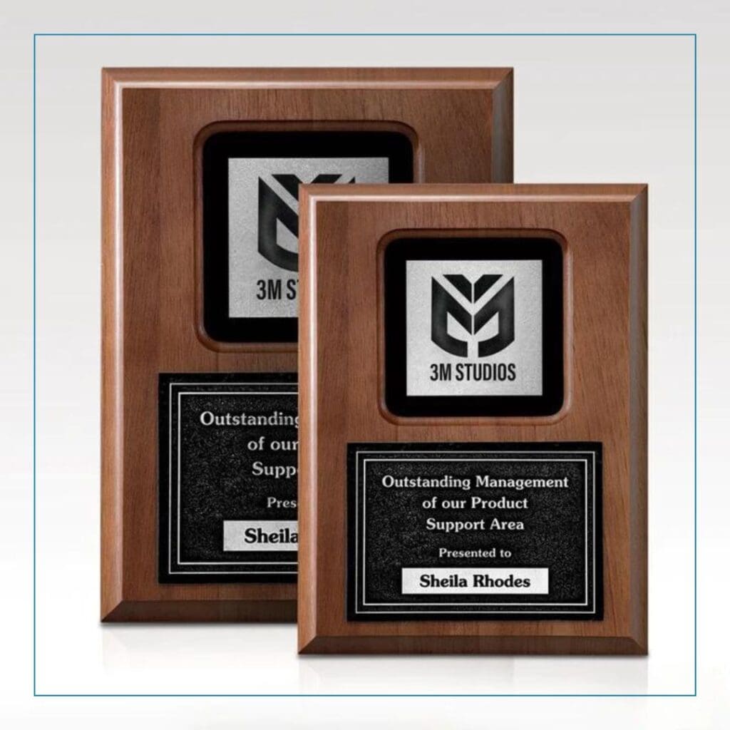 A rich wood plaque featuring a recessed area to carry graphics and words of recognition