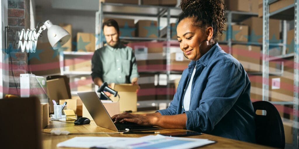 A woman and a man are working at a small business
