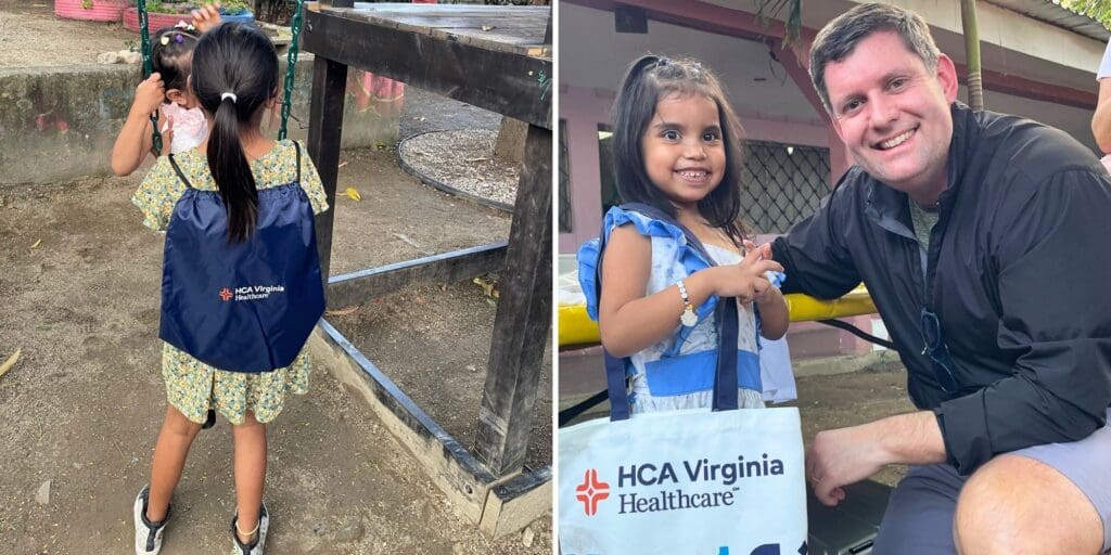 A photo of CEO Todd Mawyer of TK Promotions posing with a child and promotional products in Honduras.